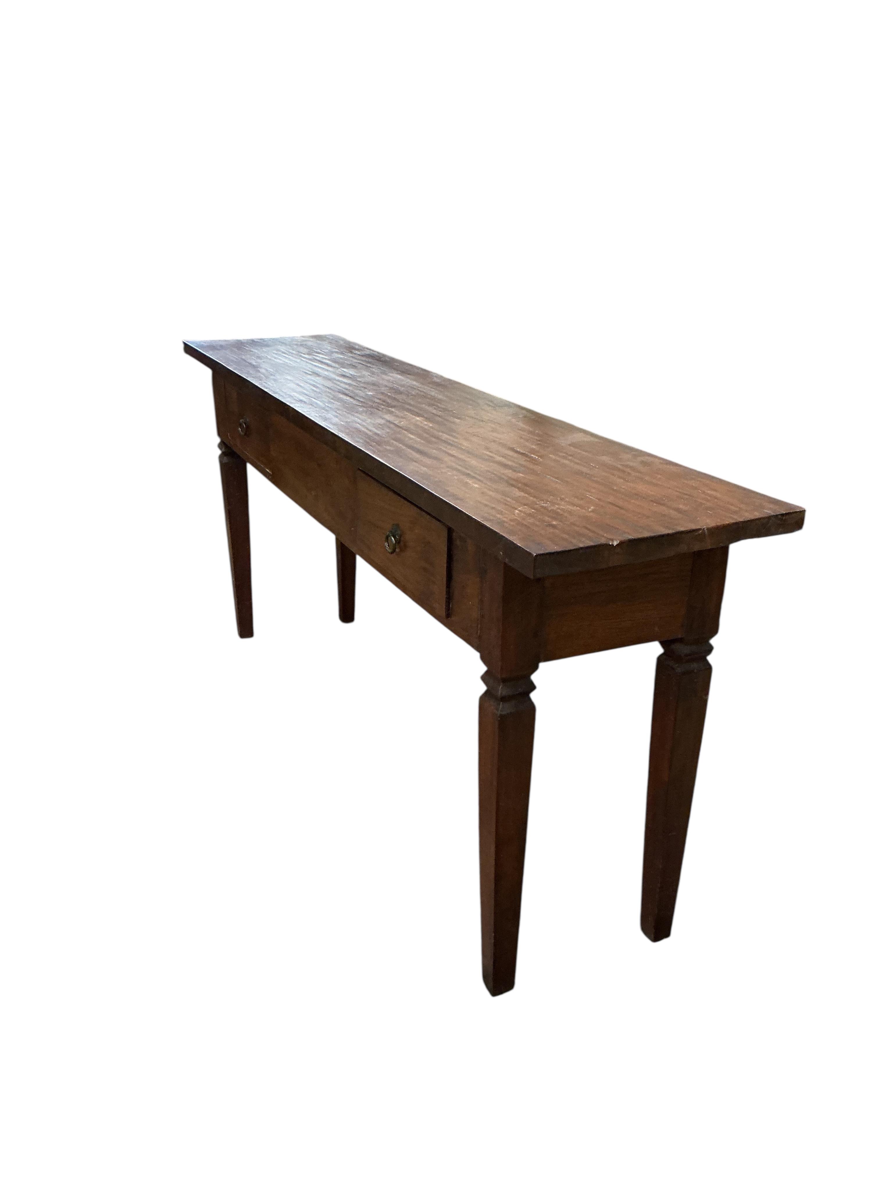 A Continental hardwood two drawer console table, width 170cm, depth 40cm, height 76cm